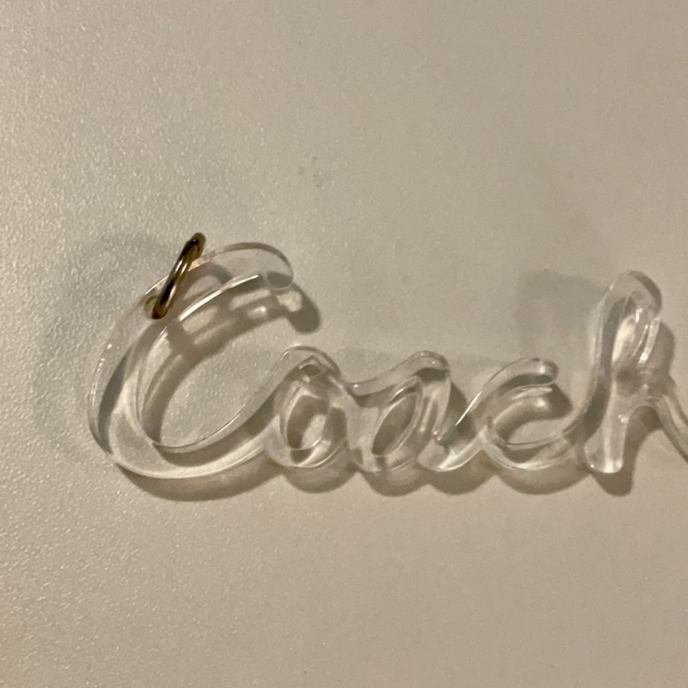 COACH acrylic 3” x 1” hangtag. Clear. Vintage